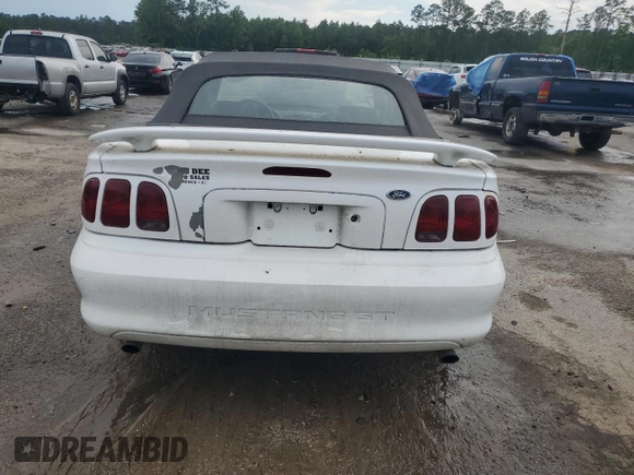 1998 Ford Mustang GT with VIN 1FAFP45X1WF263449, listed as a Copart auction lot 55851015 with 131,937 mi miles and Salvage title. Bid and sale history available at DreamBid. Image 6.