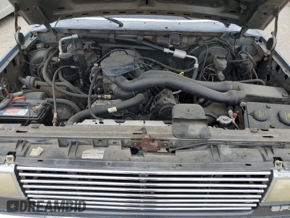 1990 Ford F-150 z VIN 1FTDF15N7LNB38801, wystawiony jako Copart lot #59738475 z przebiegiem 273 718 mil mil oraz Czysty tytuł • Clean title. Historia ofert i sprzedaży dostępna na DreamBid. Obrazek 11.