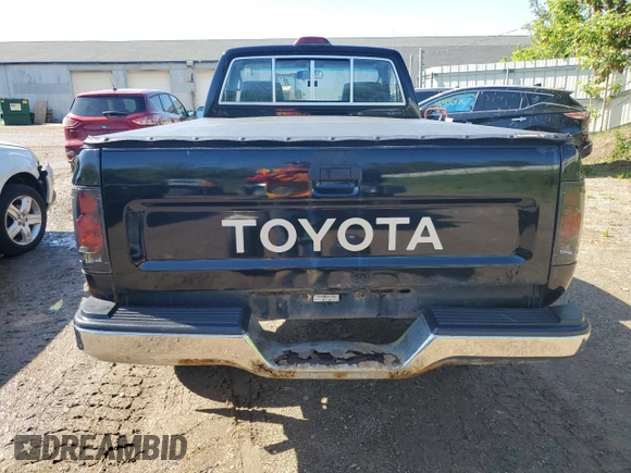 1994 Toyota Pickup DX z VIN JT4RN01P8R7065882, wystawiony jako Copart lot #56998705 z przebiegiem 86 406 mil mil oraz Czysty tytuł • Clean title. Historia ofert i sprzedaży dostępna na DreamBid. Obrazek 6.