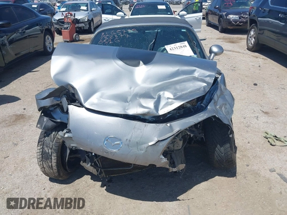 2013 Mazda MX-5 Miata Sport z VIN JM1NC2JF8D0232377, wystawiony jako IAAI lot #42312848 z przebiegiem Nie podano mil oraz . Historia ofert i sprzedaży dostępna na DreamBid. Obrazek 13.