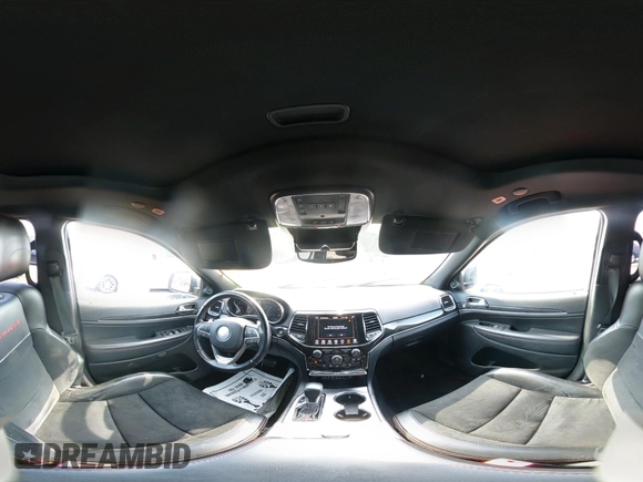 2021 Jeep Grand Cherokee Trailhawk with VIN 1C4RJFLG5MC564912, listed as a IAAI auction lot 42589787 with 25,604 mi miles and . Bid and sale history available at DreamBid. Image 18.
