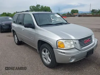 2006 GMC Envoy SLE z VIN 1GKDT13S662317827, wystawiony jako IAAI lot #42403954 z przebiegiem 132 761 mil mil oraz . Historia ofert i sprzedaży dostępna na DreamBid. Obrazek 1.