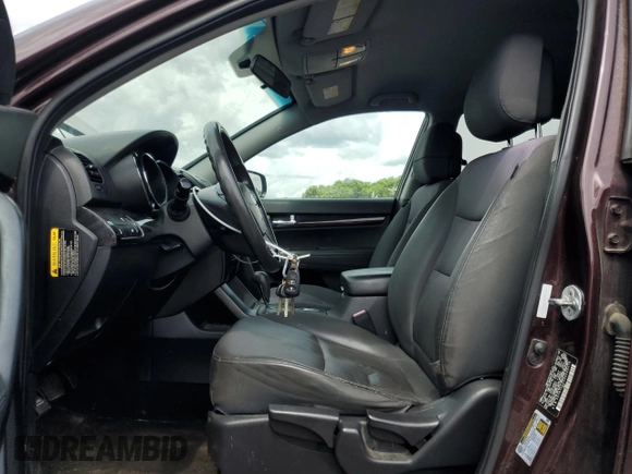 2013 Kia Sorento LX with VIN 5XYKTDA23DG389370, listed as a Copart auction lot 60645535 with 176,393 mi miles and Salvage title. Bid and sale history available at DreamBid. Image 7.