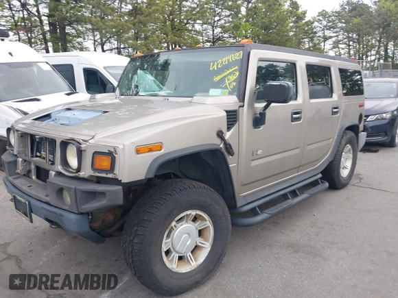 2003 Hummer H2 with VIN 5GRGN23U73H142389, listed as a IAAI auction lot 42219627 with 78,547 mi miles. Bid and sale history available at carsss.com. Image 2.