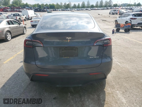 2023 Tesla Model Y Long Range z VIN 7SAYGDEE2PA041350, wystawiony jako Copart lot #56657005 z przebiegiem 25 090 mil mil oraz Szkoda całkowita • Salvage title. Historia ofert i sprzedaży dostępna na DreamBid. Obrazek 6.
