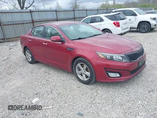 2015 Kia Optima LX with VIN 5XXGM4A7XFG446248, listed as a IAAI auction lot 42047807 with 167,000 mi miles. Bid and sale history available at carsss.com. Image 1.