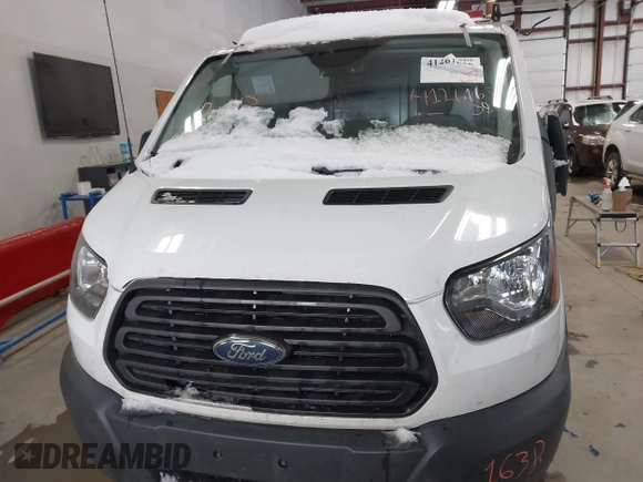 2018 Ford Transit with VIN 1FTYE1ZM6JKB50362, listed as a IAAI auction lot 41261638 with 151,266 mi miles and . Bid and sale history available at DreamBid. Image 13.