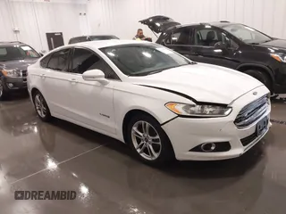 2015 Ford Fusion SE Hybrid with VIN 3FA6P0LU8FR215788, listed as a IAAI auction lot 42038194 with 136,949 mi miles and . Bid and sale history available at DreamBid. Image 1.