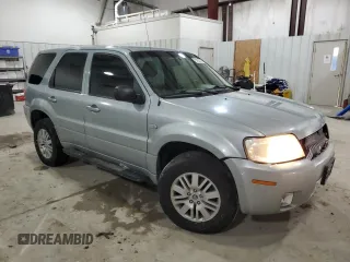 2005 Mercury Mariner Luxury z VIN 4M2CU57135DJ00228, wystawiony jako Copart lot #87603775 z przebiegiem 169 099 mil mil oraz Szkody całkowita. Historia ofert i sprzedaży dostępna na DreamBid. Obrazek 4.