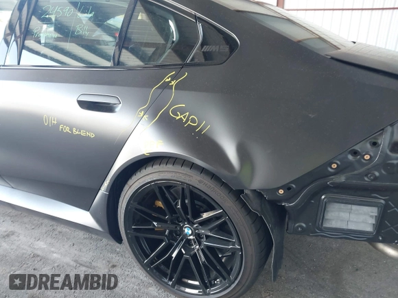 2025 BMW 5 Series with VIN WBS83FK04SCU11874, listed as a IAAI auction lot 42543784 with 4,517 mi miles and . Bid and sale history available at DreamBid. Image 18.