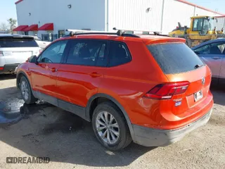 2019 Volkswagen Tiguan S with VIN 3VV1B7AX8KM113120, listed as a IAAI auction lot 41789099 with 124,355 mi miles. Bid and sale history available at carsss.com. Image 3.
