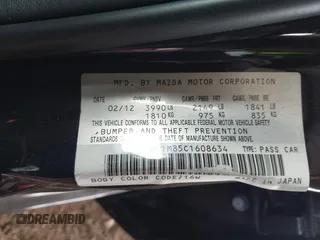 2012 Mazda 3 i Grand Touring z VIN JM1BL1M85C1608634, wystawiony jako IAAI lot #42213183 z przebiegiem 67 114 mil mil oraz . Historia ofert i sprzedaży dostępna na DreamBid. Obrazek 9.