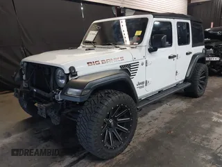 2019 Jeep Wrangler Unlimited Sport S z VIN 1C4HJXDG4KW639403, wystawiony jako IAAI lot #42158096 z przebiegiem 132 569 mil mil oraz . Historia ofert i sprzedaży dostępna na DreamBid. Obrazek 2.