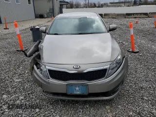 2013 Kia Optima LX z VIN 5XXGM4A70DG251868, wystawiony jako Copart lot #52921925 z przebiegiem 114 318 mil mil oraz Szkody całkowita. Historia ofert i sprzedaży dostępna na DreamBid. Obrazek 5.