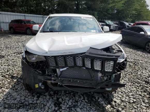 2018 Jeep Grand Cherokee Altitude with VIN 1C4RJFAGXJC122688, listed as a Copart auction lot 61290525 with 106,671 mi miles and Salvage title. Bid and sale history available at DreamBid. Image 5.
