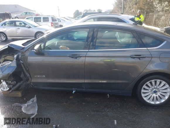 2015 Ford Fusion S Hybrid with VIN 3FA6P0UU9FR283189, listed as a IAAI auction lot 41632307 with 152,653 mi miles. Bid and sale history available at carsss.com. Image 15.