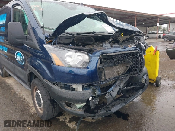 2021 Ford Transit Cargo with VIN 1FTBR1Y80MKA12125, listed as a IAAI auction lot 41773493 with 42,989 mi miles and . Bid and sale history available at DreamBid. Image 6.
