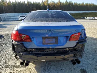 2016 BMW M5 with VIN WBSFV9C53GG343466, listed as a Copart auction lot 76460794 with 66,351 mi miles and Salvage Title. Bid and sale history available at carsss.com. Image 6.