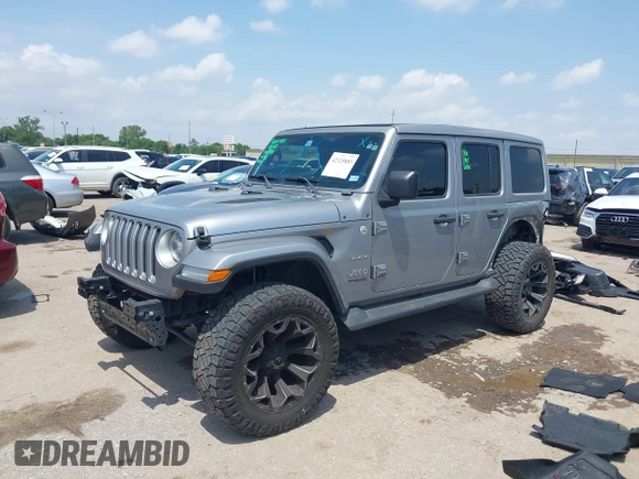 2021 Jeep Wrangler Unlimited High Altitude with VIN 1C4HJXEG3MW511185, listed as a IAAI auction lot 42125883 with 45,564 mi miles and . Bid and sale history available at DreamBid. Image 17.