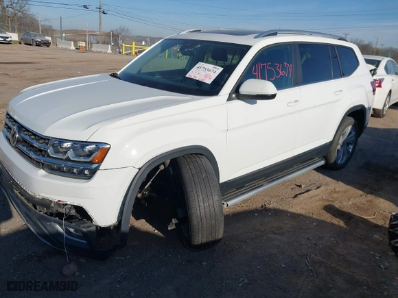 2018 Volkswagen Atlas 3.6L V6 SEL with VIN 1V2MR2CA8JC502440, listed as a IAAI auction lot 41753674 with 142,184 mi miles. Bid and sale history available at carsss.com. Image 2.
