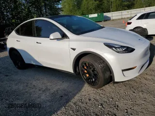2022 Tesla Model Y Long Range with VIN 7SAYGAEE7NF376795, listed as a Copart auction lot 55113135 with 66,796 mi miles and Salvage Title. Bid and sale history available at carsss.com. Image 4.
