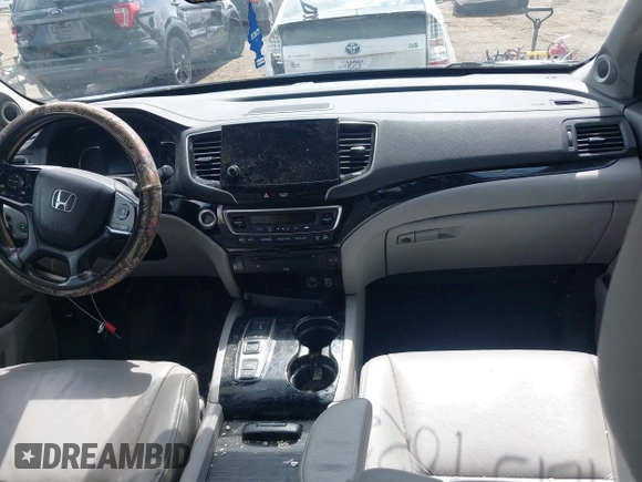 2019 Honda Pilot Touring 7-Passenger z VIN 5FNYF6H63KB000365, wystawiony jako IAAI lot #42154822 z przebiegiem 238 032 mil mil oraz . Historia ofert i sprzedaży dostępna na DreamBid. Obrazek 5.