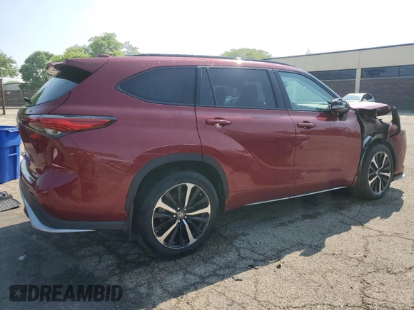 2022 Toyota Highlander XSE with VIN 5TDLZRBH2NS242545, listed as a Copart auction lot 59473185 with 150,464 mi miles and Clean title. Bid and sale history available at DreamBid. Image 3.