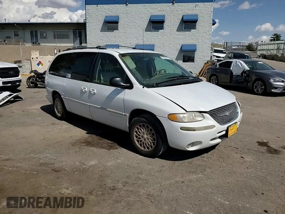 1998 Chrysler Town & Country LXi with VIN 1C4GP64L2WB637437, listed as a Copart auction lot 70504424 with 82,972 mi miles and Salvage Title. Bid and sale history available at carsss.com. Image 11.