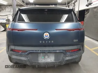2023 Fisker Ocean One z VIN VCF1ZBU25PG003706, wystawiony jako IAAI lot #41906422 z przebiegiem Nie podano mil oraz . Historia ofert i sprzedaży dostępna na DreamBid. Obrazek 16.