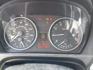 2007 BMW 3 Series 328i with VIN WBAVA33587KX72883, listed as a IAAI auction lot 42632484 with 203,514 mi miles and . Bid and sale history available at DreamBid. Image 7.