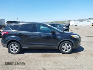 2015 Ford Escape SE with VIN 1FMCU9GX3FUC14020, listed as a IAAI auction lot 42069921 with 111,113 mi miles. Bid and sale history available at carsss.com. Image 6.