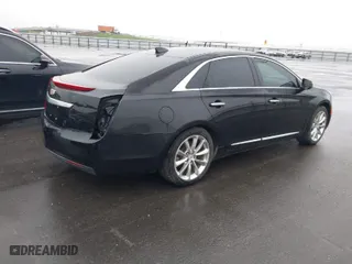 2016 Cadillac XTS Livery Package with VIN 2G61U5S38G9136327, listed as a IAAI auction lot 41935174 with 136,672 mi miles. Bid and sale history available at carsss.com. Image 4.