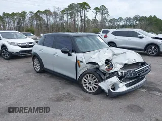 2017 MINI Hardtop 4 Door Cooper with VIN WMWXU1C34H2F77175, listed as a IAAI auction lot 41326875 with 63,597 mi miles. Bid and sale history available at carsss.com. Image 1.
