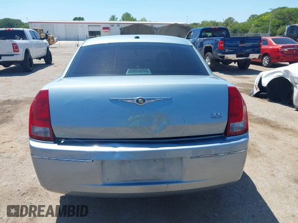 2006 Chrysler 300 Touring with VIN 2C3KA53G56H324954, listed as a IAAI auction lot 42058478 with 124,933 mi miles. Bid and sale history available at carsss.com. Image 16.