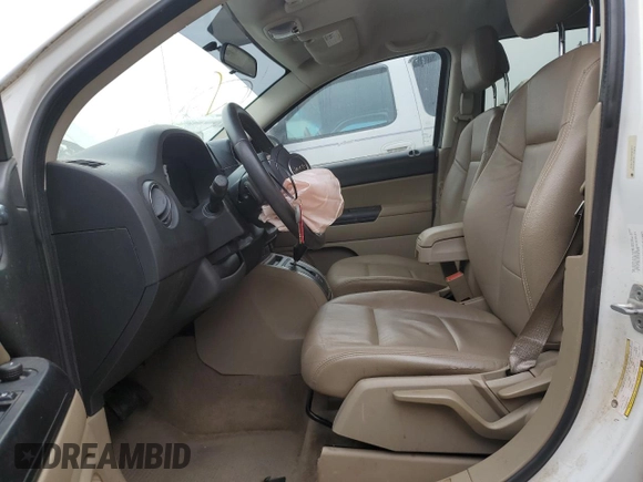 2012 Jeep Compass Latitude with VIN 1C4NJCEA2CD666392, listed as a Copart auction lot 77044444 with 175,283 mi miles and Salvage Title. Bid and sale history available at DreamBid. Image 7.