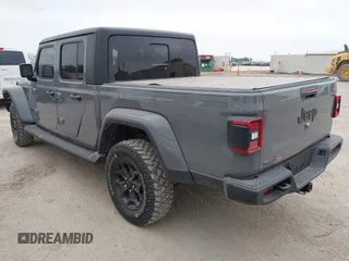 2022 Jeep Gladiator Willys with VIN 1C6JJTAMXNL137237, listed as a IAAI auction lot 41947651 with 55,199 mi miles and . Bid and sale history available at DreamBid. Image 3.