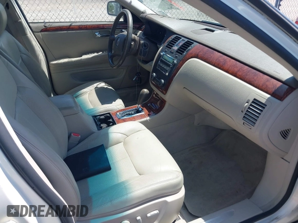 2006 Cadillac DTS 1SD z VIN 1G6KD57Y06U208812, wystawiony jako IAAI lot #42233924 z przebiegiem 120 244 mil mil oraz . Historia ofert i sprzedaży dostępna na DreamBid. Obrazek 5.