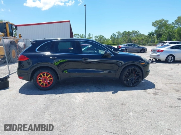 2012 Porsche Cayenne with VIN WP1AA2A21CLA02418, listed as a IAAI auction lot 42266318 with 85,345 mi miles and . Bid and sale history available at DreamBid. Image 14.