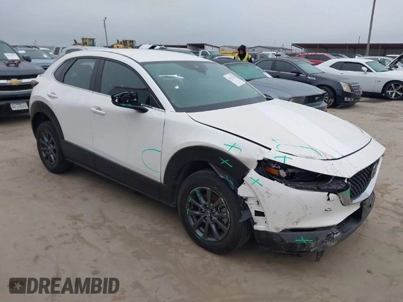 2022 Mazda CX-30 S with VIN 3MVDMBALXNM422418, listed as a IAAI auction lot 41531552 with 21,909 mi miles and . Bid and sale history available at carsss.com. Image 1.