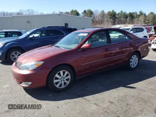 2004 Toyota Camry LE with VIN 4T1BE30KX4U297754, listed as a Copart auction lot 50795425 with 184,152 mi miles and Salvage Title. Bid and sale history available at DreamBid. Image 1.
