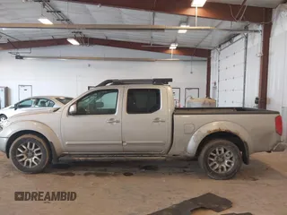 2010 Nissan Frontier SE with VIN 1N6AD0FV5AC439977, listed as a IAAI auction lot 41666404 with 152,004 mi miles and . Bid and sale history available at DreamBid. Image 14.