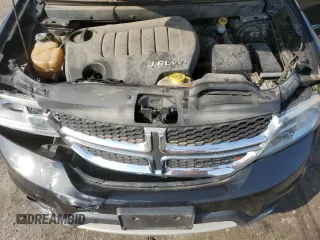 2013 Dodge Journey SXT with VIN 3C4PDCBG4DT619319, listed as a Copart auction lot 62964135 with 140,620 mi miles and Salvage title. Bid and sale history available at DreamBid. Image 12.