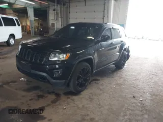 2015 Jeep Grand Cherokee Limited with VIN 1C4RJFBG4FC611156, listed as a IAAI auction lot 42021705 with 137,887 mi miles. Bid and sale history available at carsss.com. Image 17.
