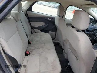 2018 Ford Focus SE z VIN 1FADP3F28JL319269, wystawiony jako Copart lot #59604555 z przebiegiem 167 726 mil mil oraz Szkoda całkowita • Salvage title. Historia ofert i sprzedaży dostępna na DreamBid. Obrazek 10.