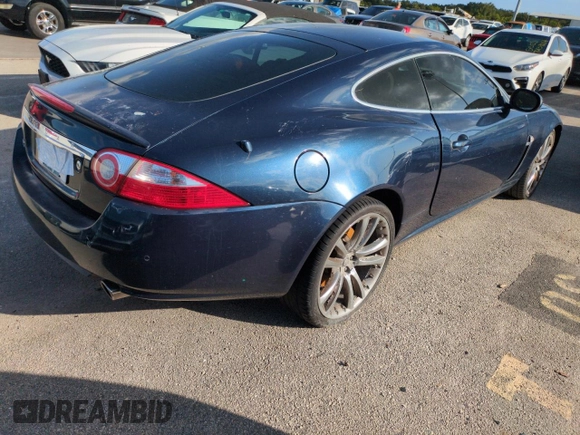 2007 Jaguar XK with VIN SAJWA43B075B09846, listed as a Copart auction lot 76014244 with Not Provided miles and Salvage Title. Bid and sale history available at carsss.com. Image 3.