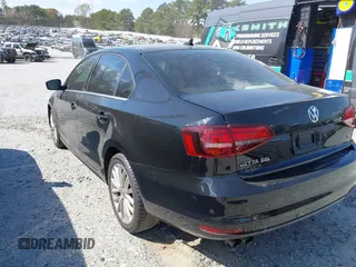 2016 Volkswagen Jetta Sedan 1.8T SEL with VIN 3VWL07AJ5GM263893, listed as a IAAI auction lot 41715603 with 188,778 mi miles. Bid and sale history available at carsss.com. Image 3.