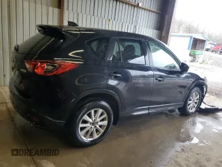 2013 Mazda CX-5 Touring with VIN JM3KE4CE6D0113909, listed as a Copart auction lot 53973355 with 117,335 mi miles and Salvage Title. Bid and sale history available at DreamBid. Image 3.