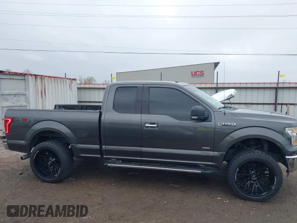 2015 Ford F-150 XLT with VIN 1FTEX1EP9FFC75210, listed as a IAAI auction lot 39041797 with 125,522 mi miles. Bid and sale history available at carsss.com. Image 14.