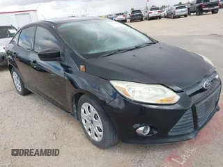 2012 Ford Focus SE z VIN 1FAHP3F23CL449397, wystawiony jako IAAI lot #42534329 z przebiegiem 165 593 mil mil oraz . Historia ofert i sprzedaży dostępna na DreamBid. Obrazek 1.
