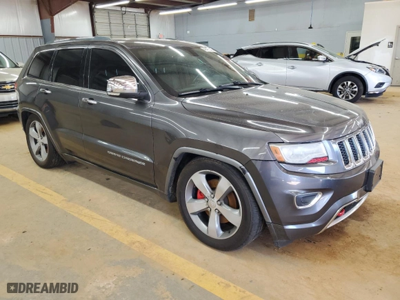 2014 Jeep Grand Cherokee Overland with VIN 1C4RJFCT2EC137511, listed as a Copart auction lot 49499545 with 211,173 mi miles and Clean Title. Bid and sale history available at carsss.com. Image 4.